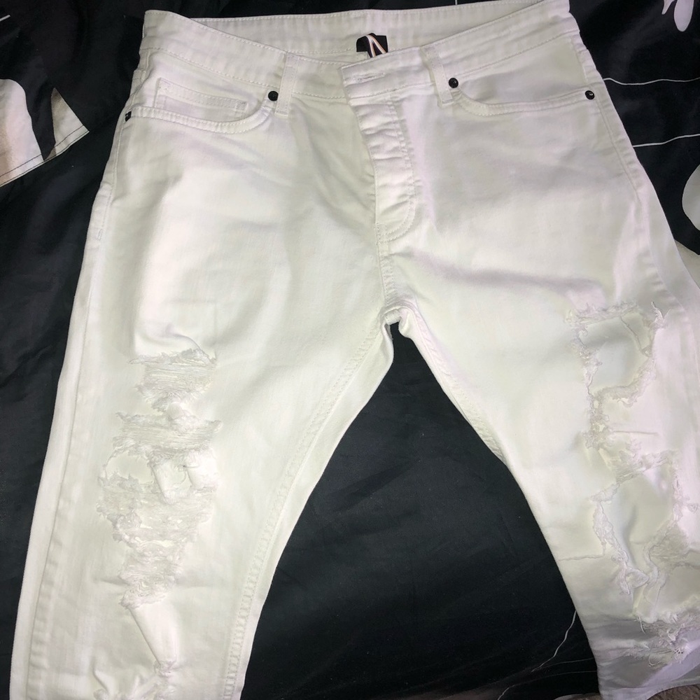 Ripped white jeans